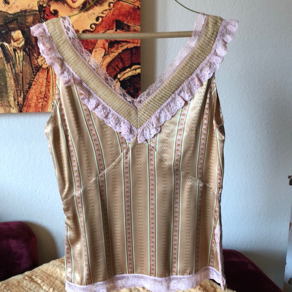Size 10 100% silk blouse. Beautiful
